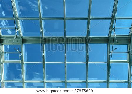 Glass Roof Of The Ceiling Is Made Of Transparent Windows. A Modern Ecological Structure For Saving E