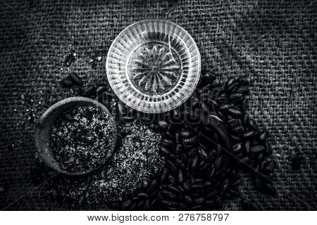 Home Remedy To Cure Lice Or Joon On Brown Colored Surface I.e. Custard Apple Seeds Dried And Powdere