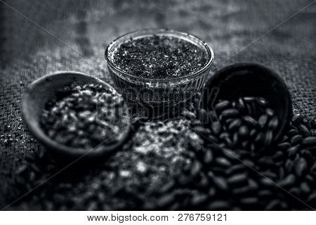 Home Remedy To Cure Lice Or Joon On Brown Colored Surface I.e. Custard Apple Seeds Dried And Powdere