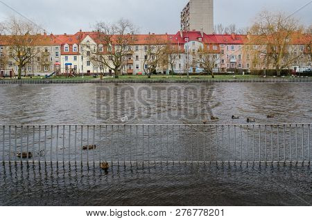 River And City -  Sunken Boulevards In The Coastal City Of Kolobrzeg On The River During A Strong St