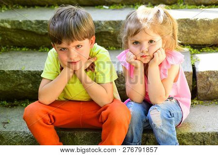 Small Girl And Boy On Stairs. Relations. Childhood Love. Couple Of Little Children. Boy And Girl. Su