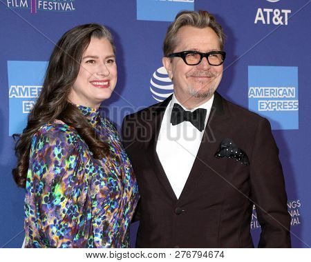 PALM SPRINGS - JAN 17:  Gisele Schmidt, Gary Oldman at the 30th Palm Springs International Film Festival Awards Gala at the Palm Springs Convention Center on January 17, 2019 in Palm Springs, CA