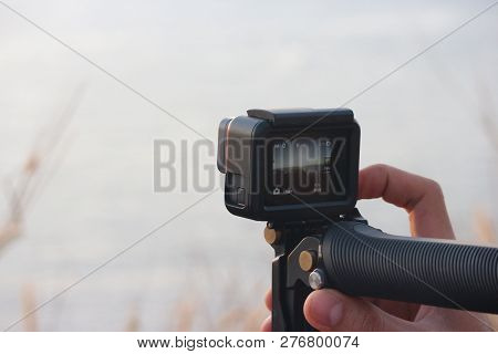 2018 December 28. Phuket Thailand. A Man Holding  Go Pro Camera To Taking A Photo Of Natural View Of