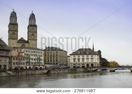 Zurich, Switzerland - Oct 130th, 2018: View Of Grossmunster And Zurich Old Town From Limmat River. T