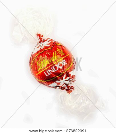 Aytos, Bulgaria - April 02, 2014: Milk Chocolate Lindor Truffle. Lindt Is Recognized As A Leader In 