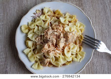 Vermicelli On A Plate. Vermicelli On A Wooden Background. Meat Spaghetti