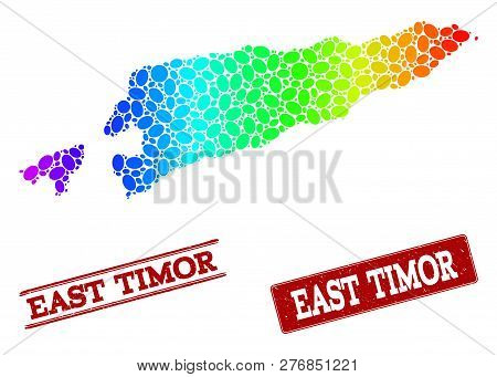 Spectrum Dotted Map Of East Timor And Red Grunge Stamps. Vector Geographic Map In Bright Spectrum Gr