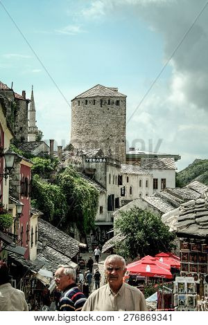 Mostar, Bosnia - June 6, 2008: Main Street Of The Mostar Bazaar In The Old Town With Pedestrians Pas