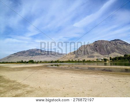 The Sandy River Bank Of The North Thompson River In The Beautiful Dry Landscape Of Kamloops, British