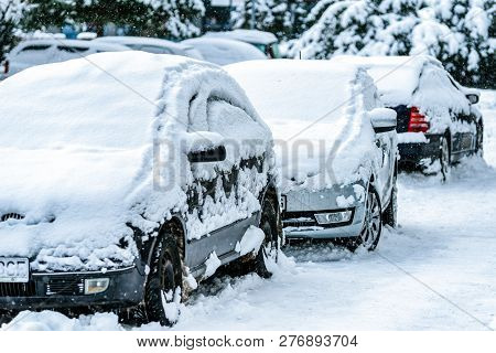 Parked Cars Covered With Snow. Inter Season In City