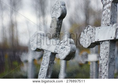 Wo Stone Crosses In The Cemetery In Autumn