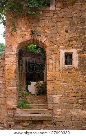 An Old Doorway In The Historic Hill Village Of Oprtalj In Istria, Croatia