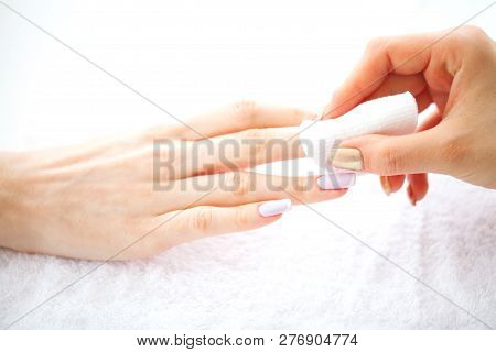 Spa Manicure. French Manicure At Spa Salon. Woman Hands In A Nail Salon Receiving A Manicure Procedu