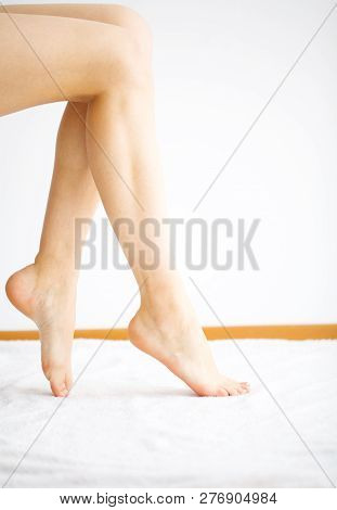 Hair Removal. Close Up Woman Hands Touching Long Legs, Soft Skin