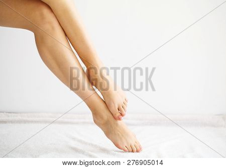 Hair Removal. Close Up Woman Hands Touching Long Legs, Soft Skin