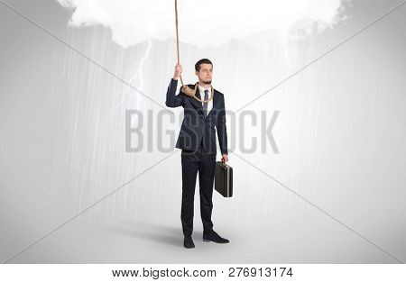 Young businessman trying to suicide with pointing hands concept