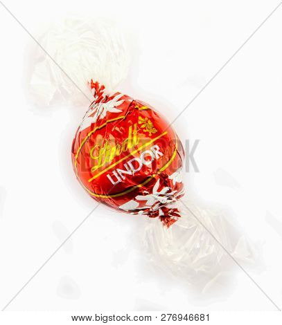 Aytos, Bulgaria - April 02, 2014: Milk Chocolate Lindor Truffle. Lindt Is Recognized As A Leader In 