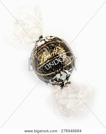 Aytos, Bulgaria - April 02, 2014: Milk Chocolate Lindor Truffle. Lindt Is Recognized As A Leader In 
