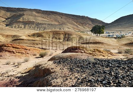 Colored sands in the Makhtesh Gadol erosion crater in the desert in Israel