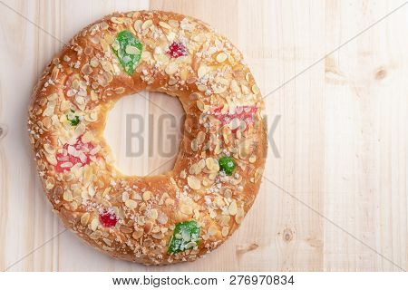 Spanish Typical Epiphany Cake Roscon De Reyes On A Wooden Background