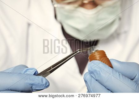 Proccess Of Collecting Possible Gunshot Residue From Suspected Clothes In Police Lab