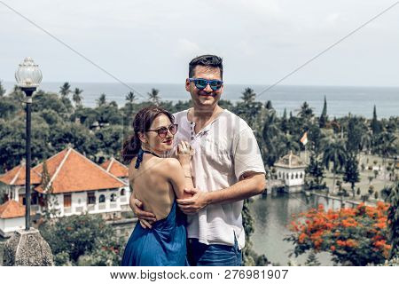 Bali, Indonesia - December 29, 2018: Young Couple At Taman Ujung Water Palace.
