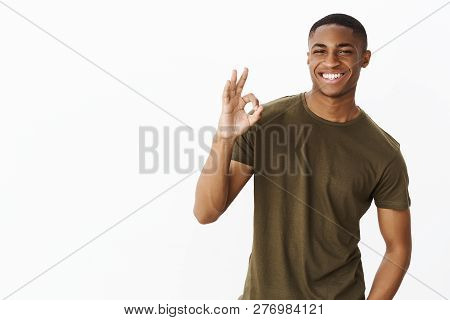 I Got You Covered Babe. Charismatic Handsome And Confident Young African Man In Casual T-shirt Smili