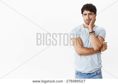 Annoyed And Tired Employer Being Fed Up Of Silly Excuses Leaning Head On Palm With Uninterested And 