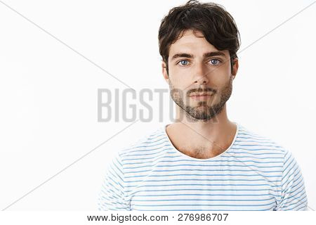 Authentic Shot Of Young Attractive Guy With Slight Rash On Neck After Shaving Looking Strict And Ser