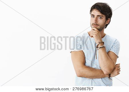 Hmm You Telling Interesting Things. Curious Handsome Businessman Talking To Partner Listening Ideas 