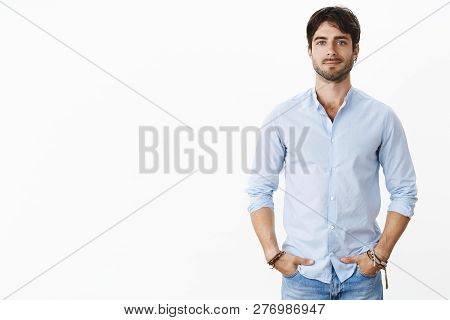 Portrait Of Handsome Successful Male Entrepreneur In Stylish Shirt Smiling Self-assured Standing In 