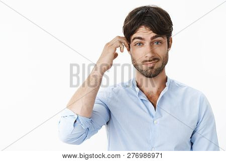 Portrait Of Cofnused And Clueless Good-looking Boyfriend With Blue Eyes And Beard Cannot Understand 