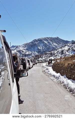 Traffic Jam And Highway Blockage Due To Snowfall At Tsomgo Lake. Tourist Vehicles Lined Up To Climb 