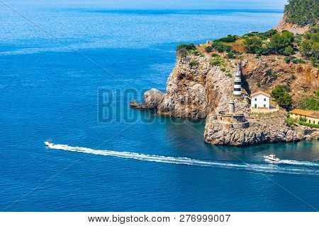 Lighthouse Of Puerto De Soller On Majorca Island, Spain