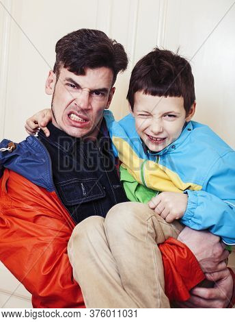 Faher And Son Together Having Fun At Home, Lifestyle Happy Family, People At Home