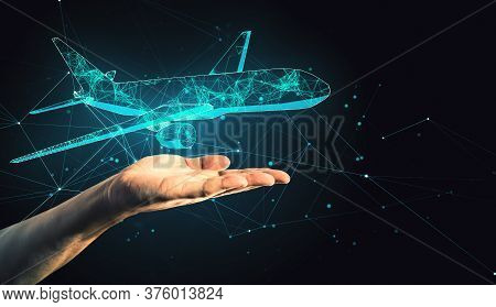 Hand Holding Abstract Polygonal Airplane On Black Background. Ai And Teamwork Concept. Mock Up