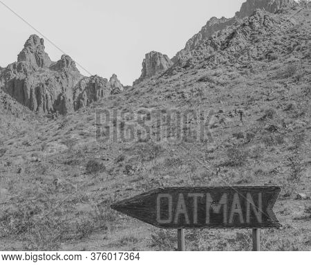 Oatman Sign, A Wild West Ghost Town In Black And White. On U.s. Route 66 In The Black Mountain Range