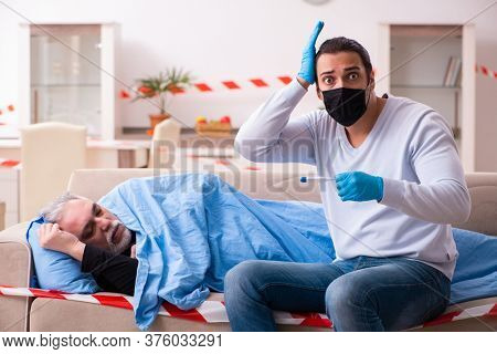 Father and son in coronavirus disease concept at home