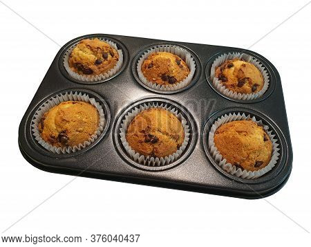 Muffin Pan With Cooked Muffins Isolated On White Background