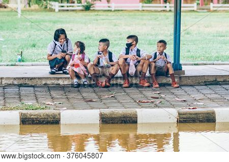 Kanchanaburi,thailand-july 2,2020:unidentified Elementary School Students Wear Face Mask To Prevent 