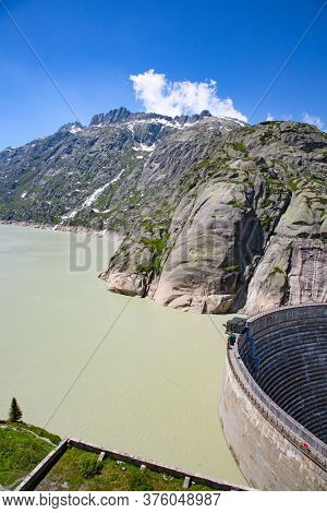Rhone glacier, source of Rhone river, melting and retreating due to global warming. Rhone glacier is loosing up to 2 meters in length every year.