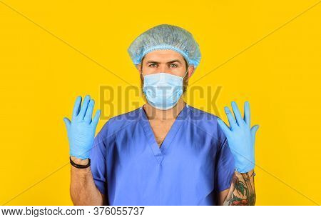 Man Doctor Uniform Yellow Background. Type Of Virus. Coronavirus Concept. Expect Virus To Mutate. Hu