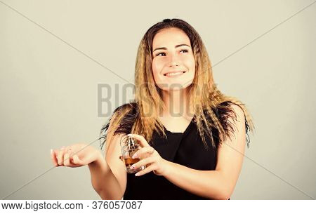 Pretty Woman With Bottle Perfume. Wearing Fragrance Is Easy. Pick Perfume. Cosmetics Shop. Beauty Pr