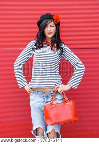 Young Woman In Modern French Style, Wear In Jeans And Jemper, Hat Beret. Casual Fashionable Style Fo