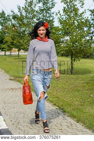Young Woman In Modern French Style, Wear In Jeans And Jemper, Hat Beret. Casual Fashionable Style Fo
