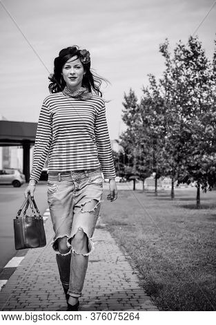 Young Woman In Modern French Style, Wear In Jeans And Jemper, Hat Beret. Casual Fashionable Style Fo