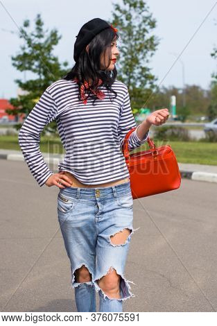 Young Woman In Modern French Style, Wear In Jeans And Jemper, Hat Beret. Casual Fashionable Style Fo