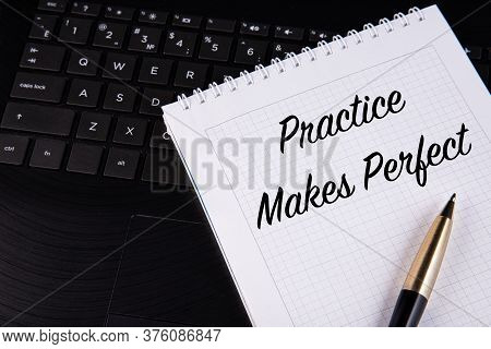 Practice Makes Perfect - Written On A Notebook With A Pen.