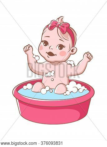 Baby Girl Bathes. Cute Infant In Bathtub, Smiling Toddler With Pink Ribbon Sitting In Tub And Washes