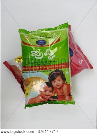 Closeup Of Two Different Types Pink And Green Color Government Of Karnatakas, Dwcd Department Packed